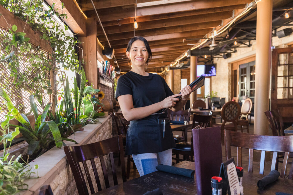 man in business casual shirt smiling
